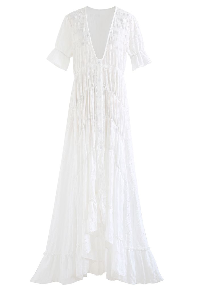 فستان طويل بفتحة رقبة على شكل V وحافة غير متماثلة باللون الأبيض